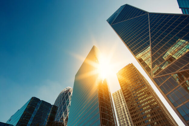 Skyscraper,Glass,Facades,On,A,Bright,Sunny,Day,With,Sunbeams